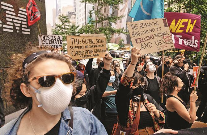 Environmental volunteers staged a mass protest in New York